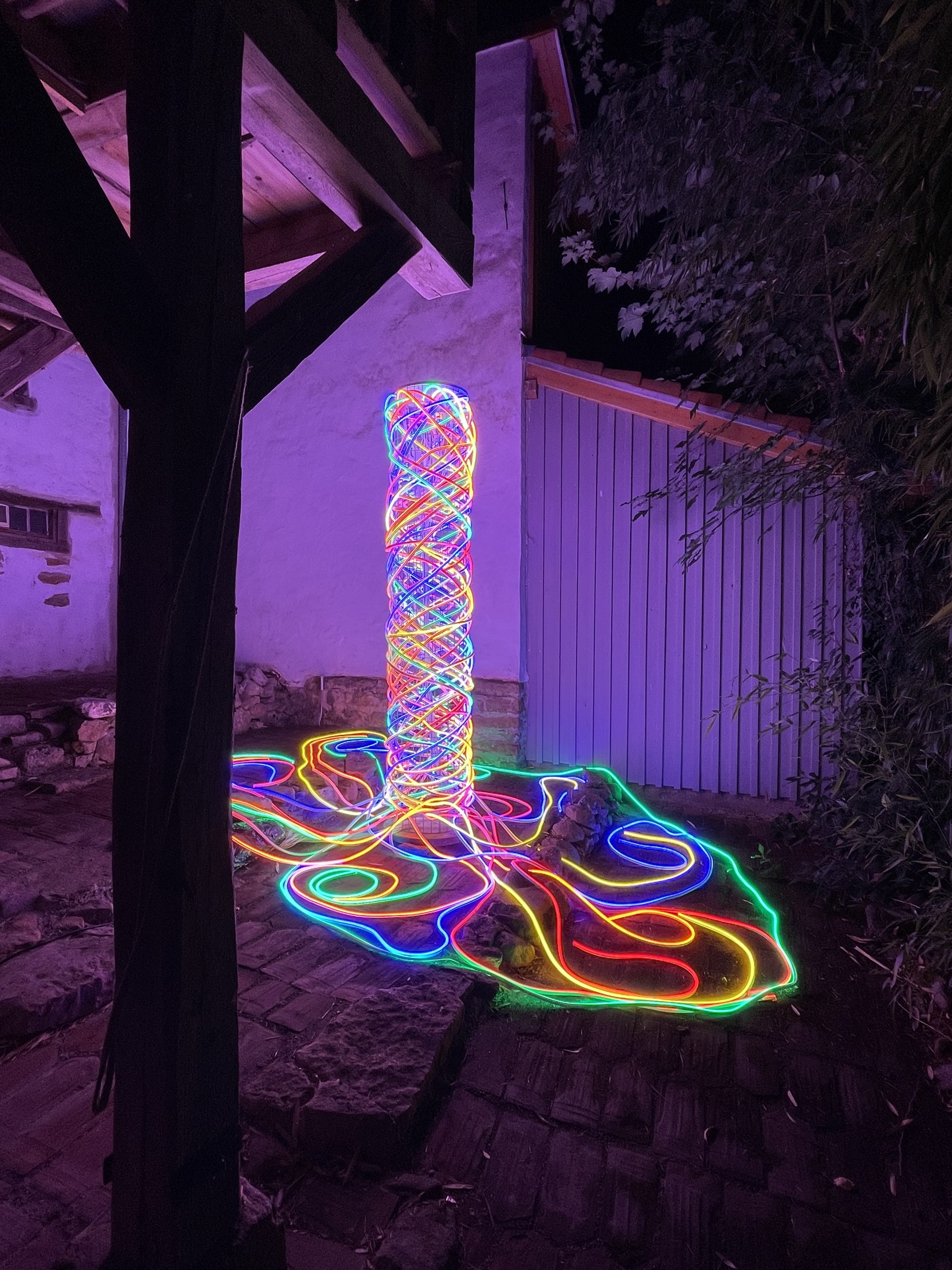 Unfolding Light, 2026 — night view in its spatial setting
