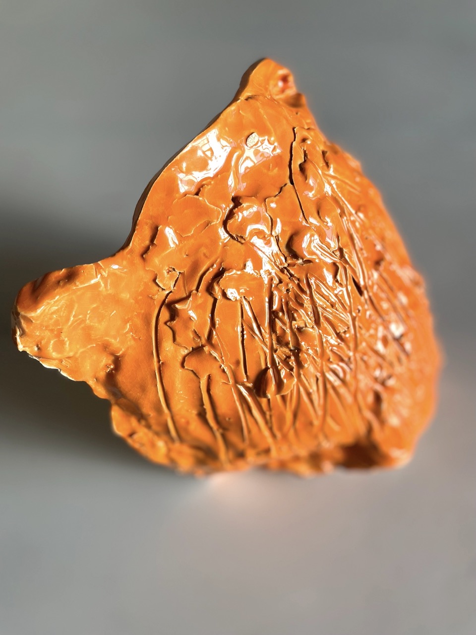 Florian Mehnert, orange glazed ceramic, 2025