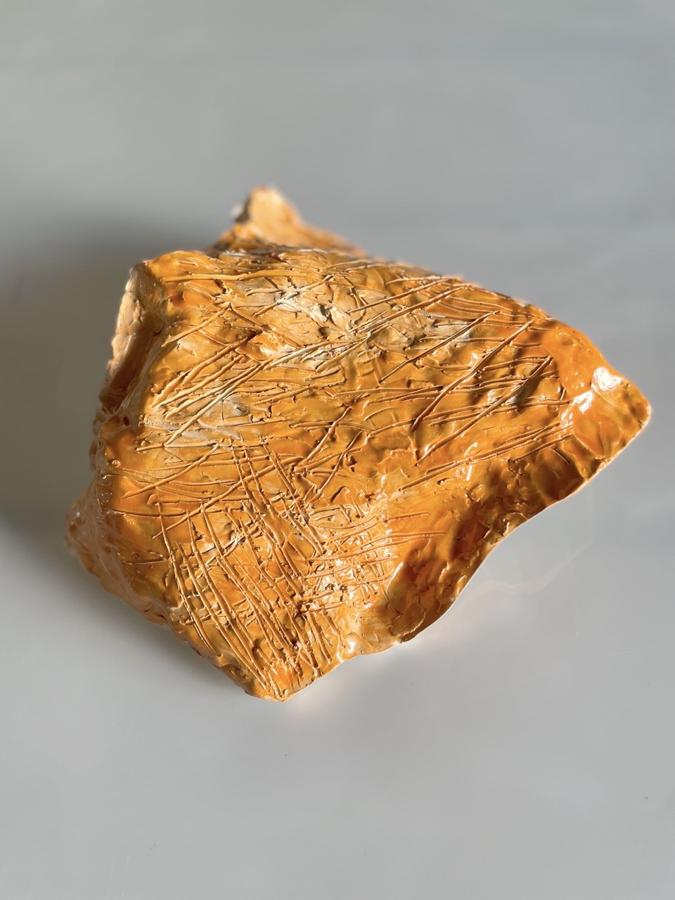Florian Mehnert, orange glazed ceramic, 2025
